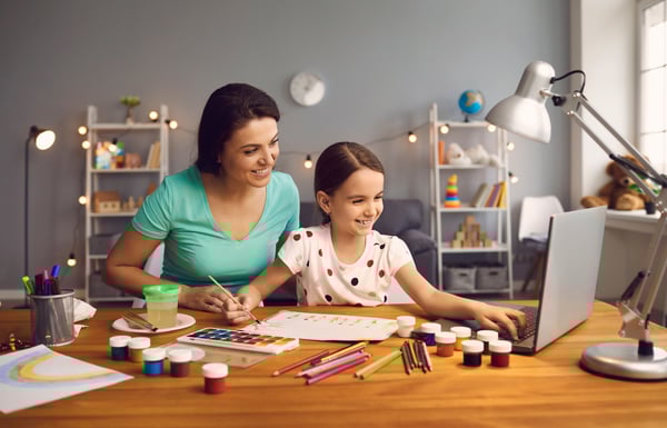 Mom helping child with homework